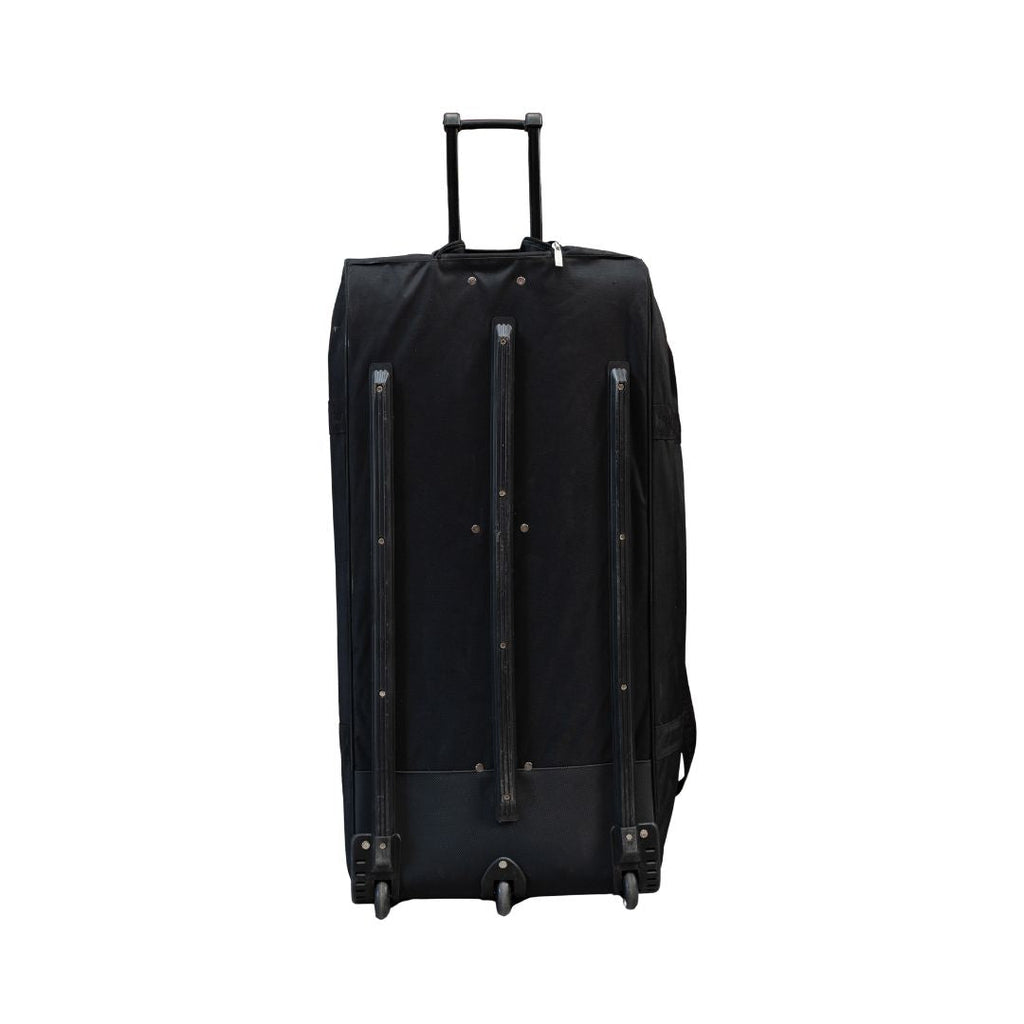 Mercian HOEV126GKBLK black goalkeeper hockey wheel bag rear view with telescopic handle and rolling wheels